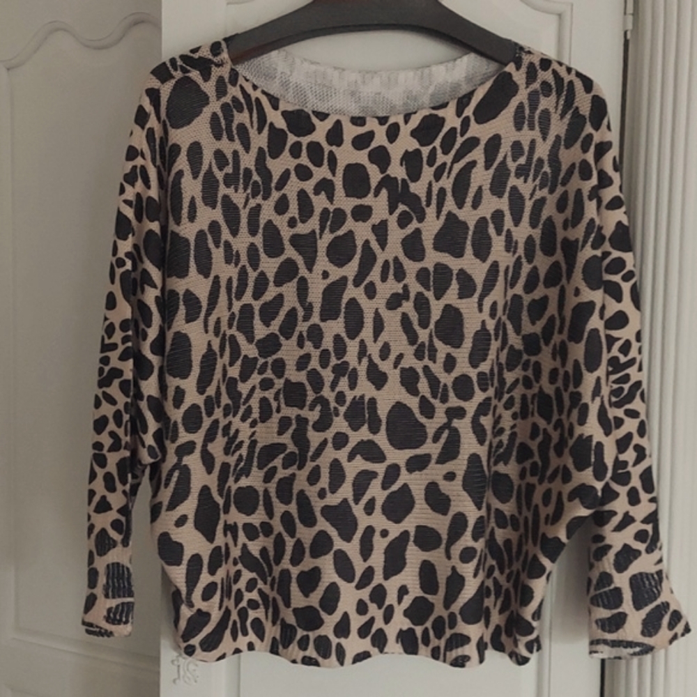 Animal print Top in black and khaki.